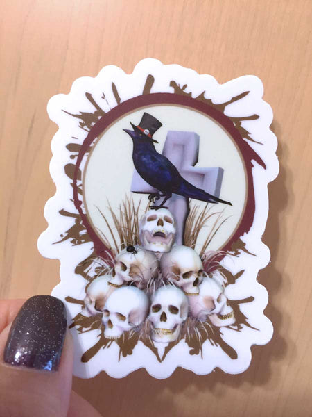 Sir Raven Skully - Raven on a Pile of Skulls Art - 2.32" x 3" Die Cut Sticker