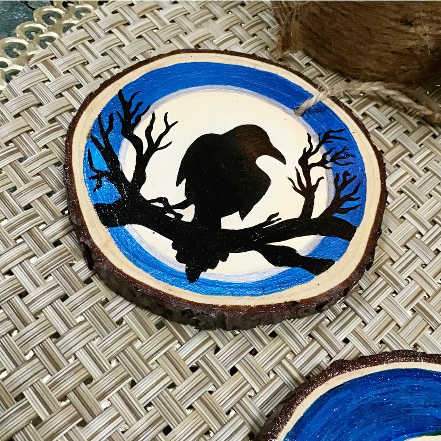 Magical Raven Silhouette - Hand Painted Wooden Round Ornament by Artist Donna Lisa